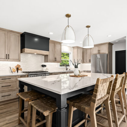 Stained kitchen cabinets with painted island