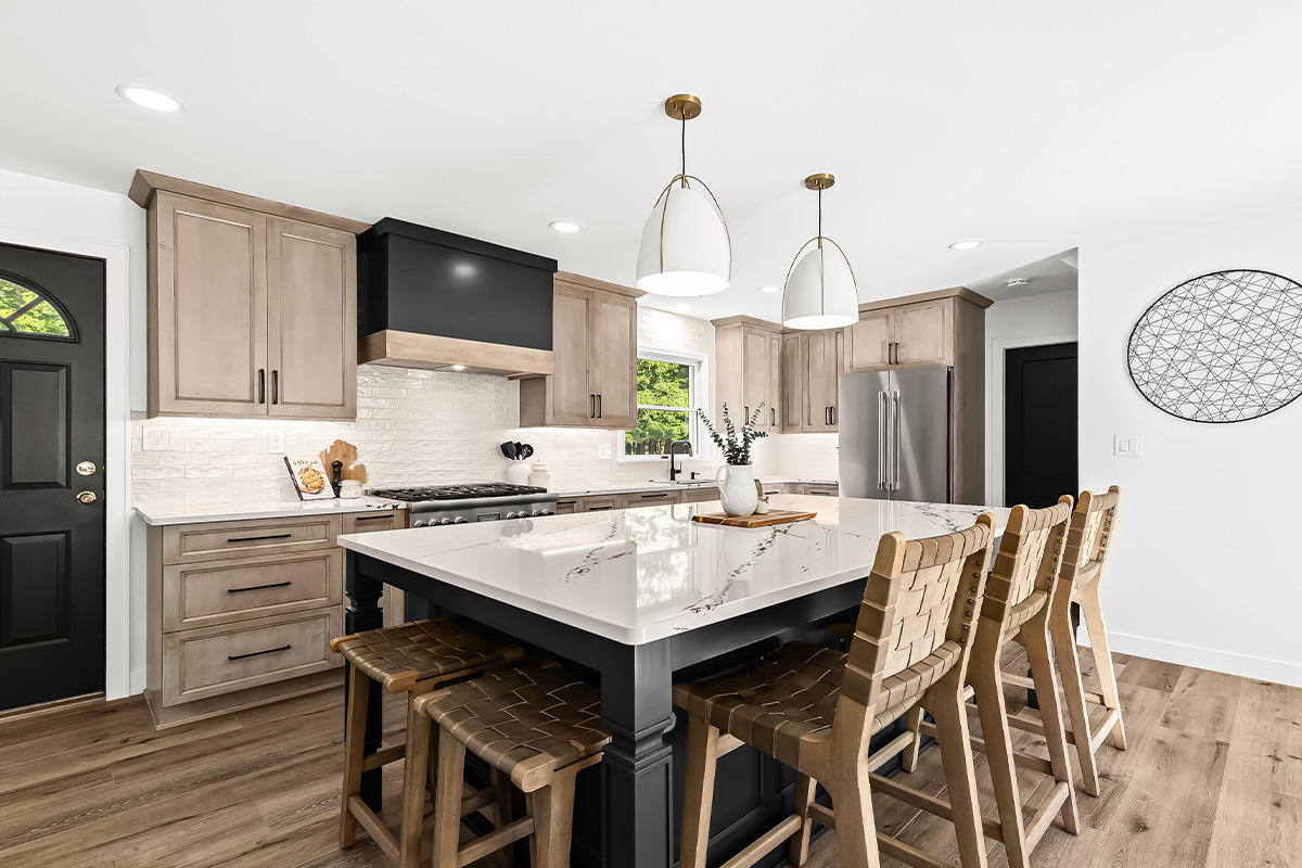 Stained kitchen cabinets with painted island