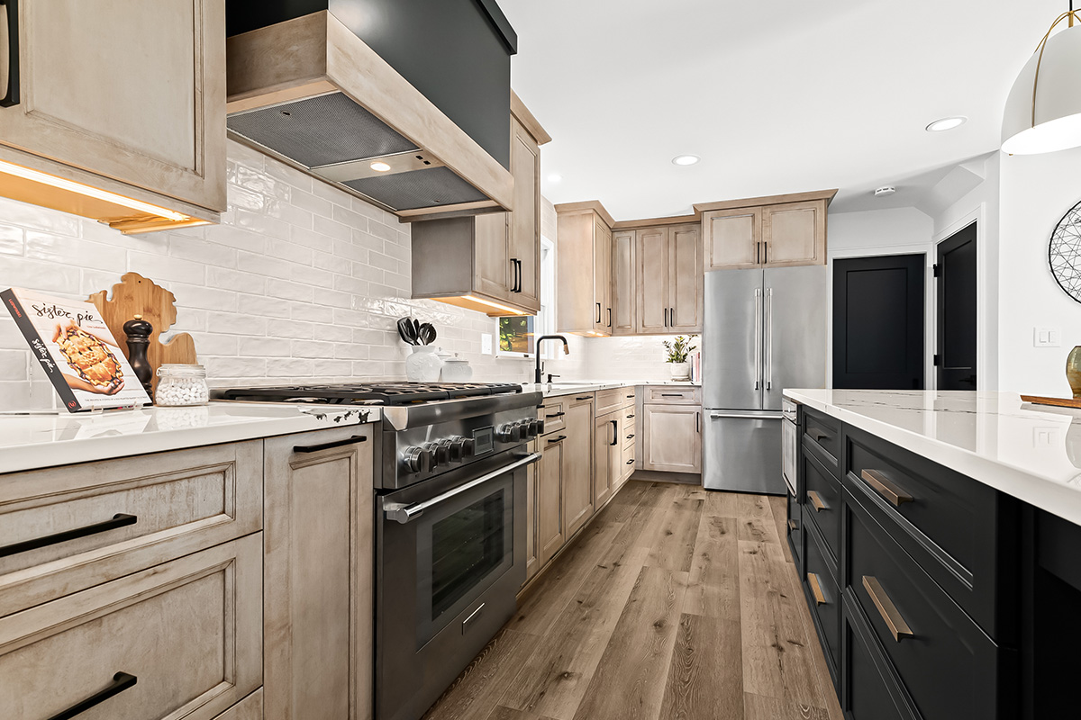 Stained kitchen cabinets with painted island