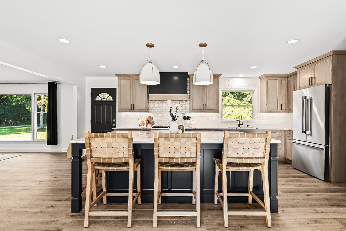 Stained kitchen cabinets with painted island