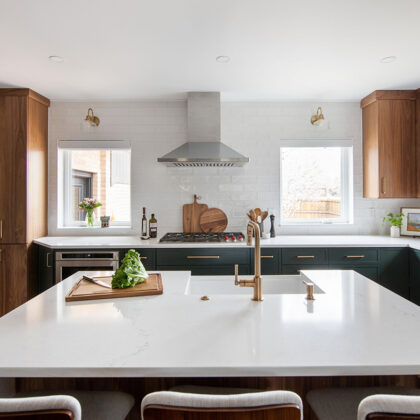 Stained and painted open floor plan kitchen with island