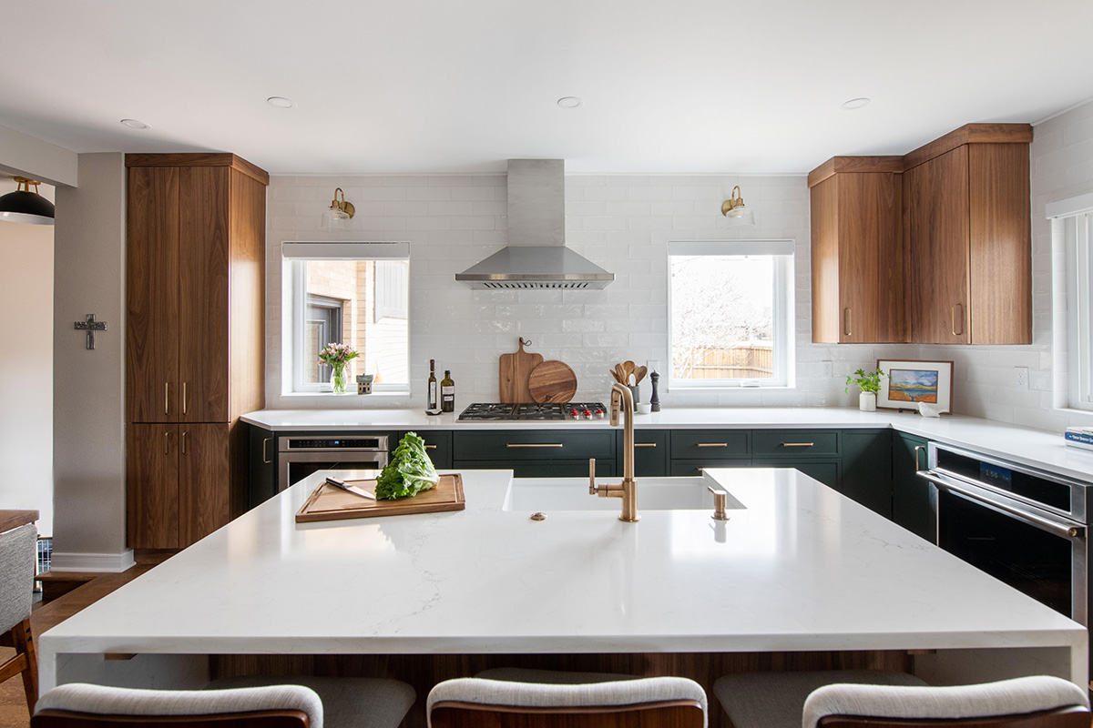 Stained and painted open floor plan kitchen with island