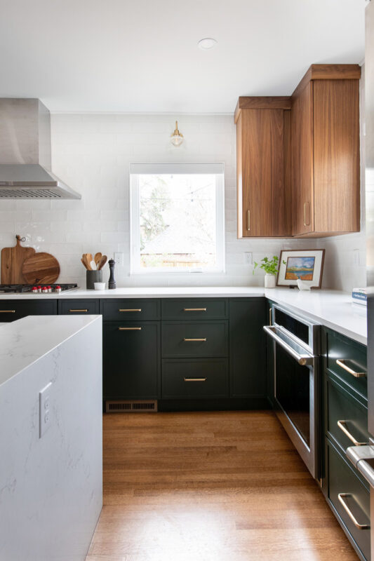 Stained and painted open floor plan kitchen with island