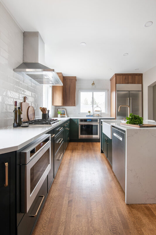 Stained and painted open floor plan kitchen with island