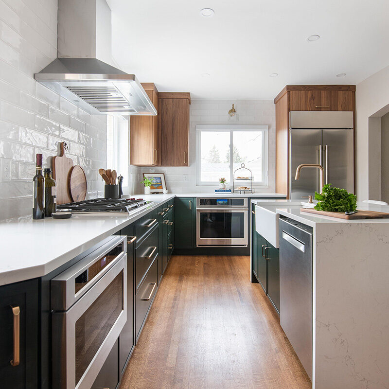 The Charm is Back - Gold Kitchen Sink & Jasper Green Cabinets