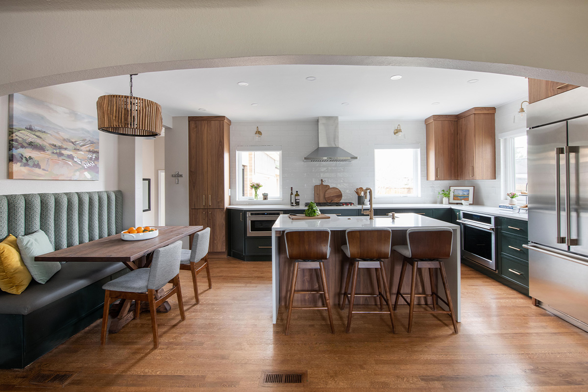 Stained and painted open floor plan kitchen with island