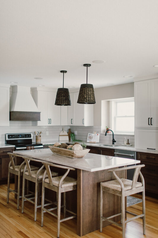 Painted and stained kitchen cabinets, including island.