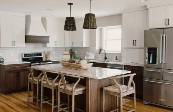 Painted and stained kitchen cabinets, including island.