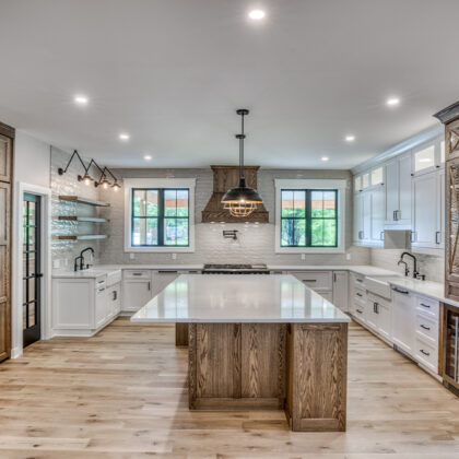 Stained and painted kitchen cabinets with island