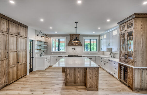 Stained and painted kitchen cabinets with island