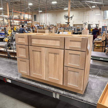 Tall Combination Sink Vanity with two 3-Drawer stacks on both sides of the sink area in the middle