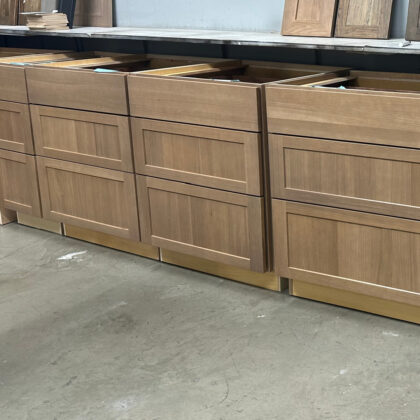 3 drawer bases in warehouse area. Stained with Sable finish on rift white oak.