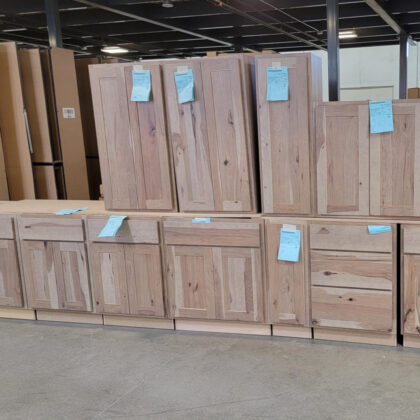 Various stained cabinets in a warehouse