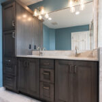 Stained bathroom vanity and mirror