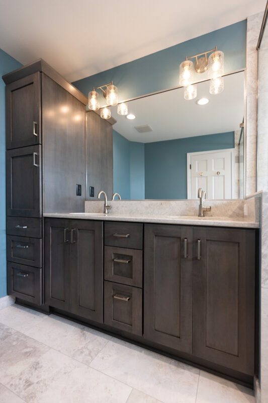 Stained bathroom vanity and mirror