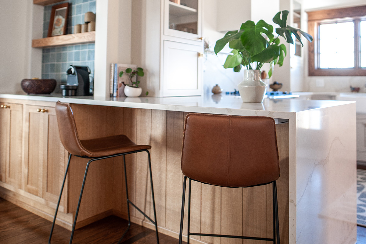 Small painted kitchen with stained accent cabinets