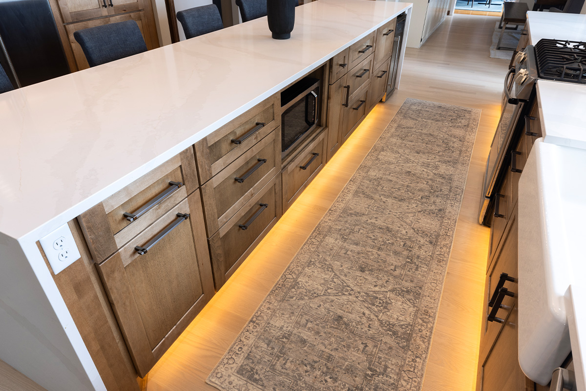 Kitchen island with undercabinet lighting.