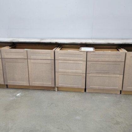 Stained base cabinets in warehouse area