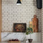 highlighting subway tile backsplash with plants and other kitchen decor