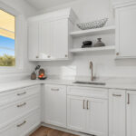 White painted kitchen cabinets with open shelves