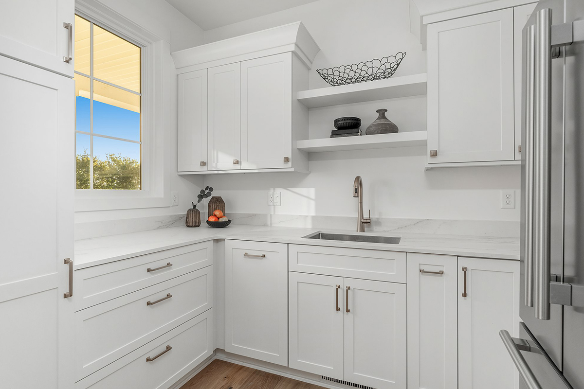 White painted kitchen cabinets with open shelves