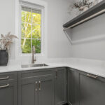 Painted laundry room cabinets