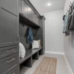 Painted mudroom locker cabinets and bench seating