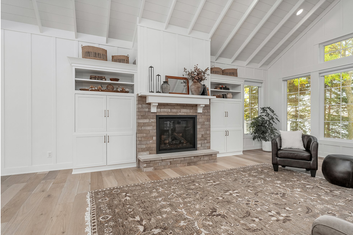 Painted living room cabinets surrounding fireplace