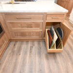 stained cabinets with pullout storage