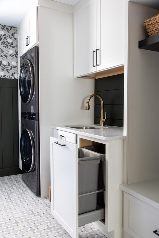 White painted laundry room cabinets