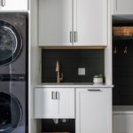 White painted laundry room cabinets