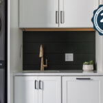 White painted laundry room cabinets