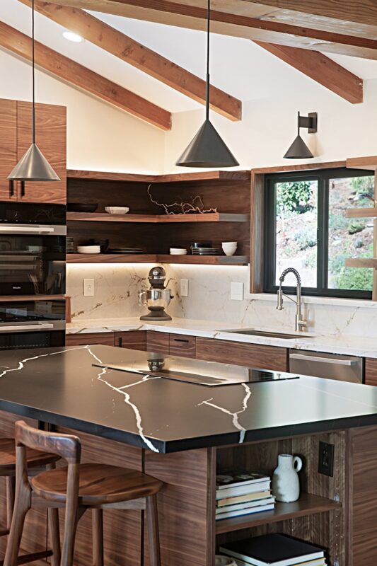 Walnut natural contemporary kitchen with vaulted ceiling and wood beams