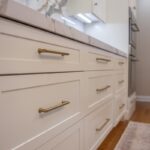 Soft cream painted kitchen cabinets