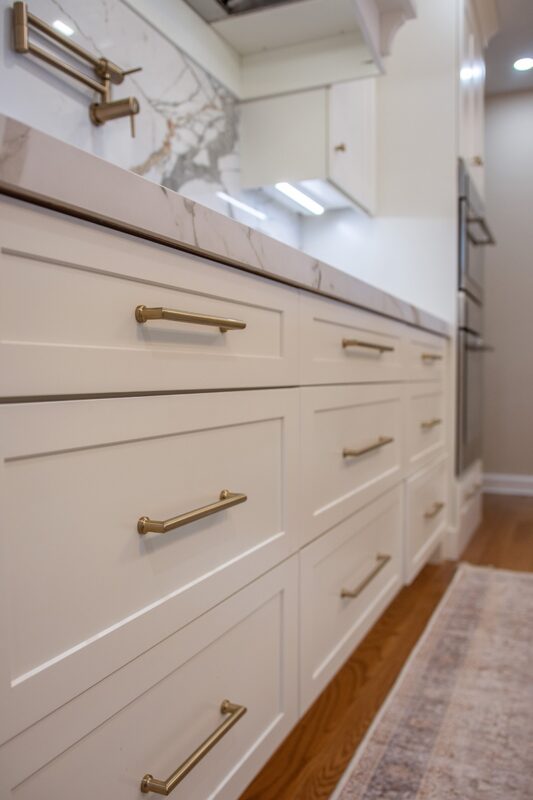 Soft cream painted kitchen cabinets