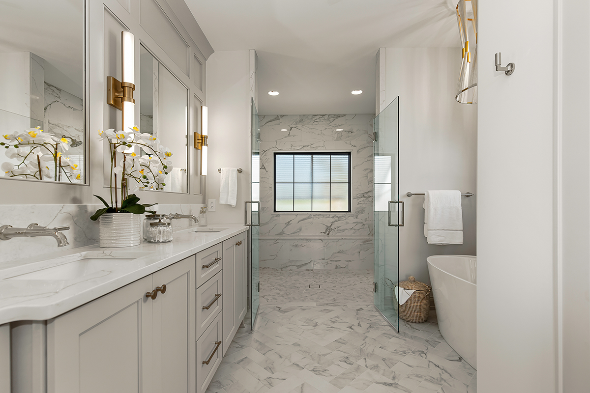 Painted bathroom vanity and shower with clear glass walls