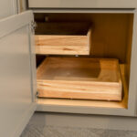 Base cabinet in the corner with 2 roll trays