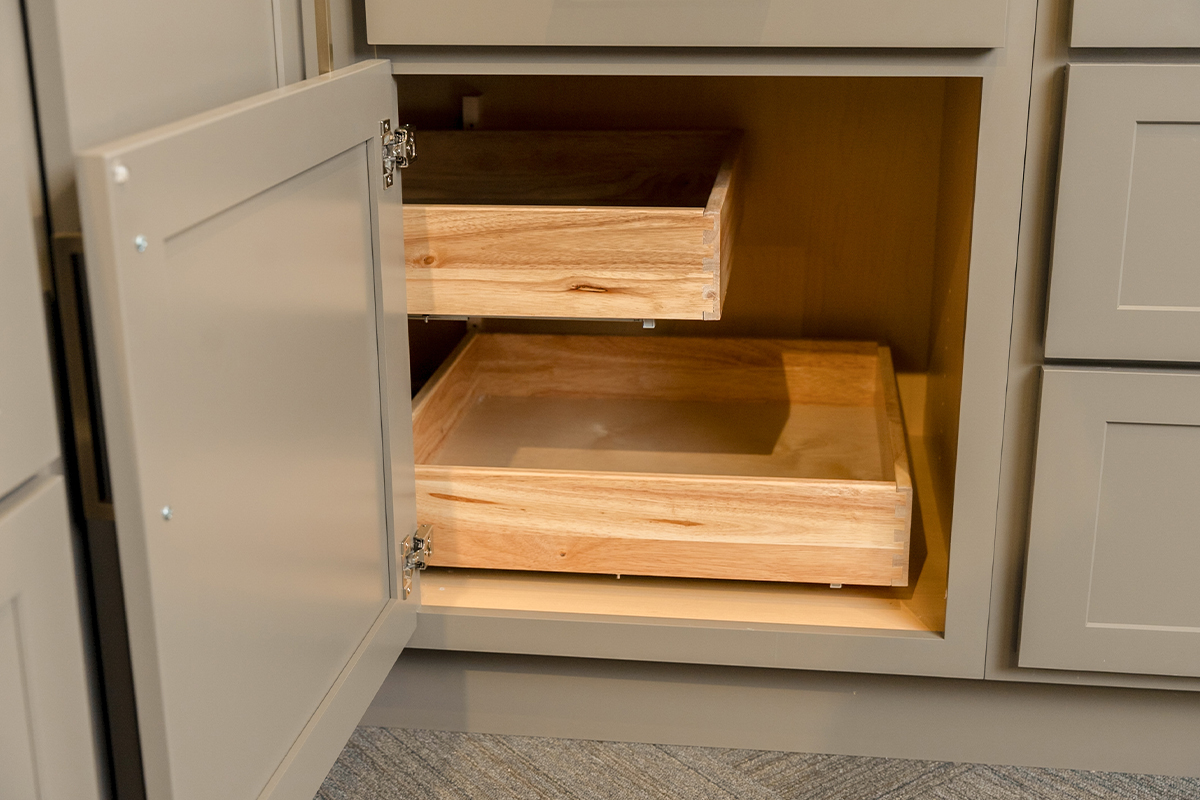 Base cabinet in the corner with 2 roll trays