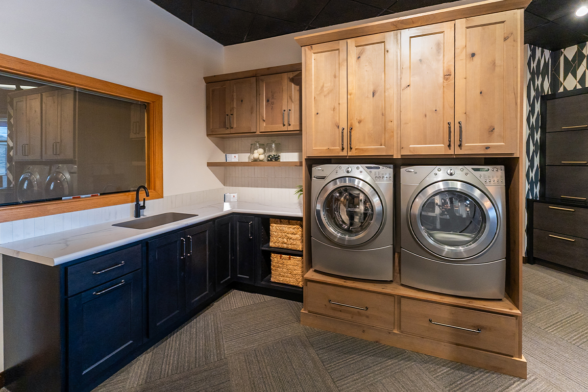 Painted and stained laundry room cabinet display