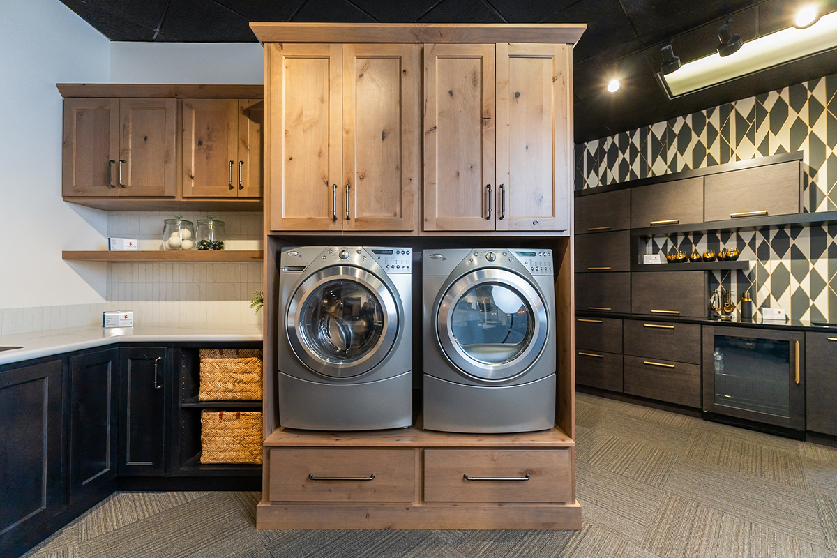 Painted and stained laundry room cabinet display