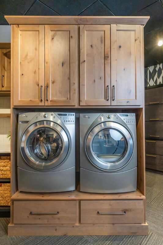 stained laundry room cabinet display