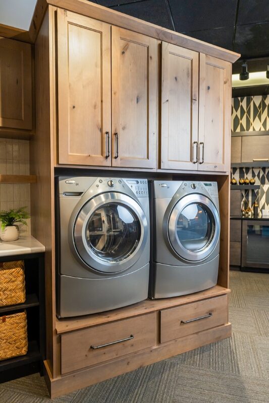 stained laundry room cabinet display