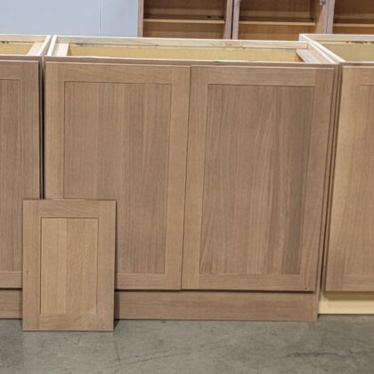 Full height door base cabinet stained with Sable on Rift White Oak
