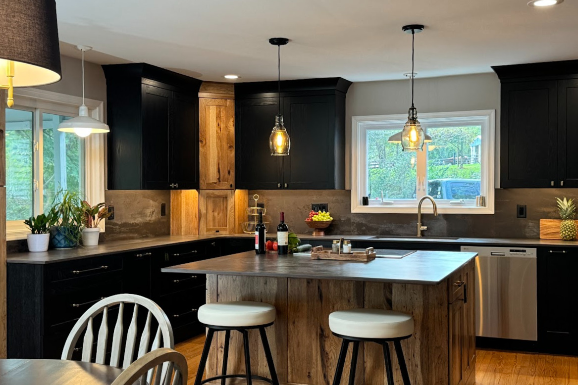 Kitchen with black painted and rustic natural cabinets