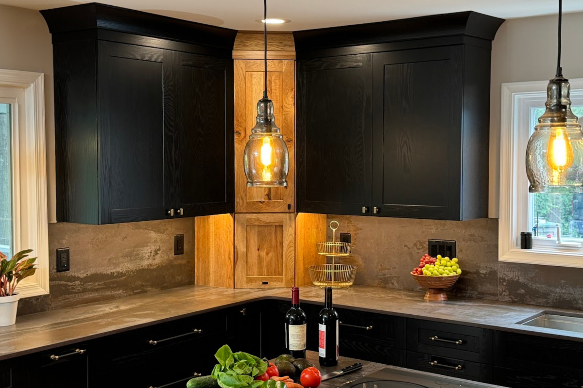 Kitchen with black painted and rustic natural cabinets