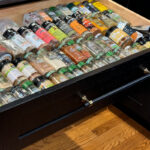 Spice drawer rack full of spices