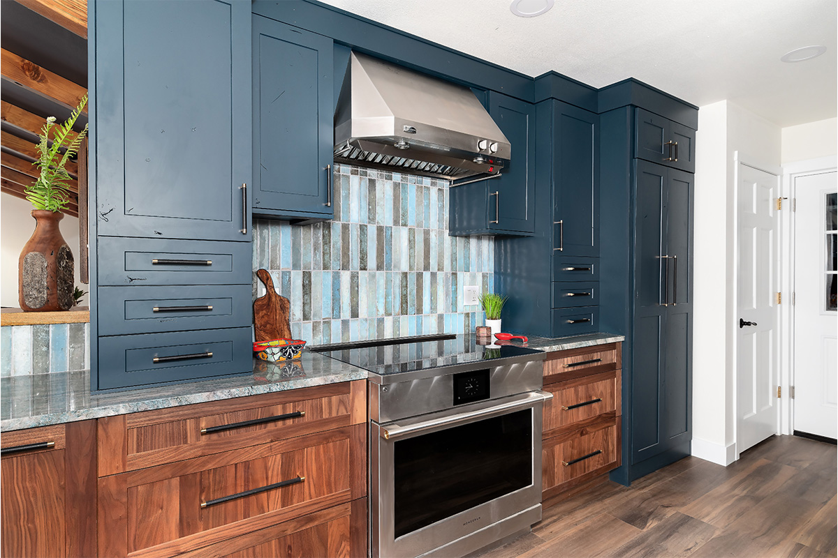 Painted blue and walnut Natural kitchen cabinets