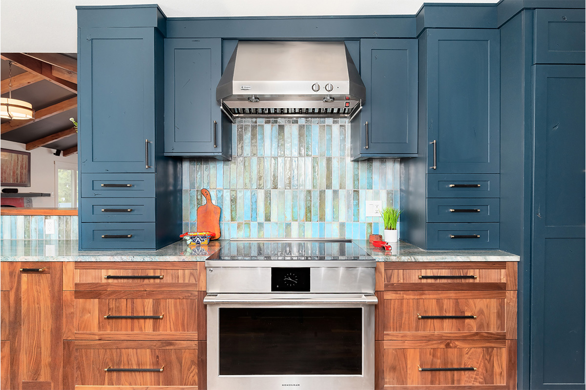 Painted blue and walnut Natural kitchen cabinets