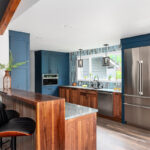 Painted blue and walnut Natural kitchen cabinets