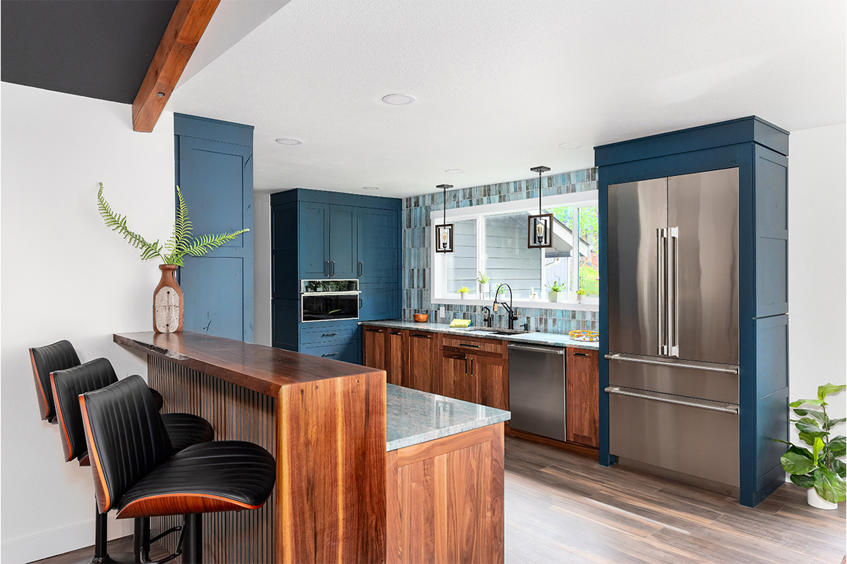 Painted blue and walnut Natural kitchen cabinets
